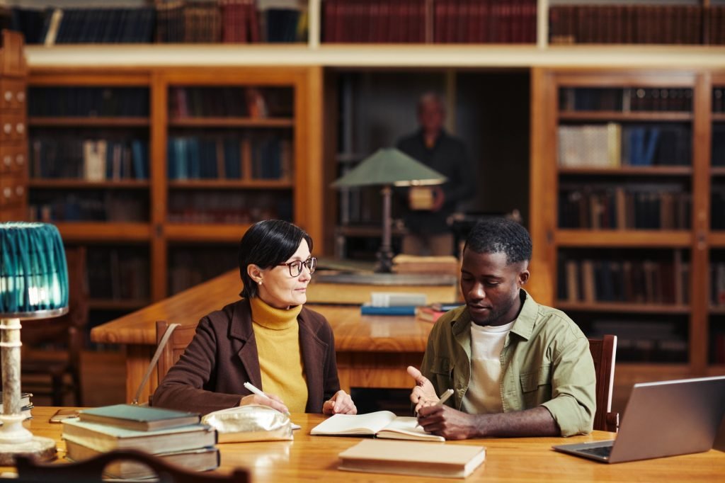 Two Students in Library